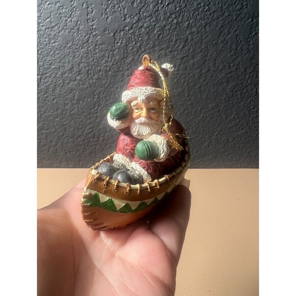 Vintage House of Llyod Christmas Around The World Santa In Canoe Figurine Decor - Picture 2 of 6